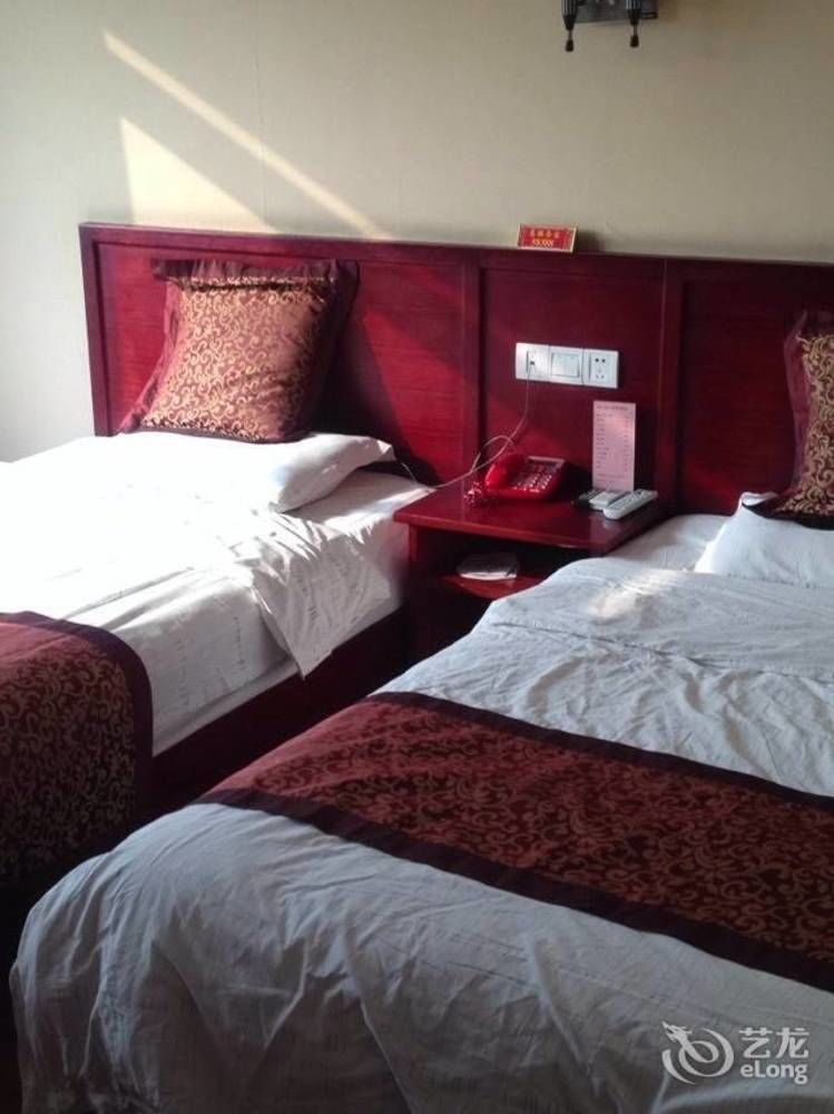 Yinhao Business Hotel Dazhong Bagian luar foto